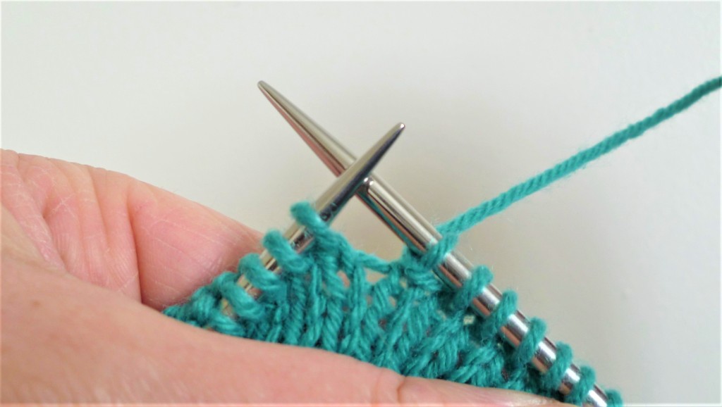 Wrap and turn short rows. Take yarn back to correct side of work.